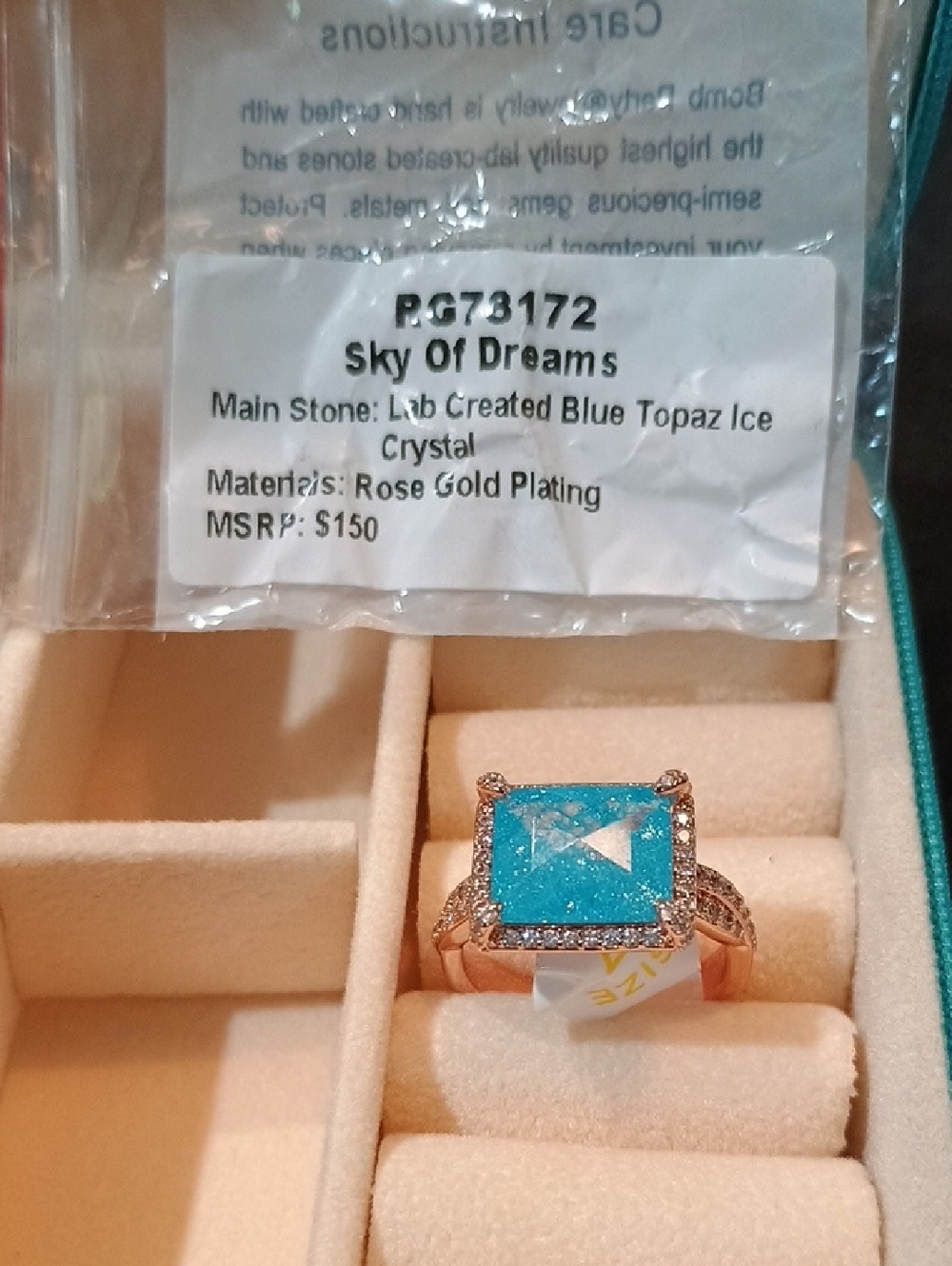 bp Rose Gold Ring with Bright Blue Center Stone